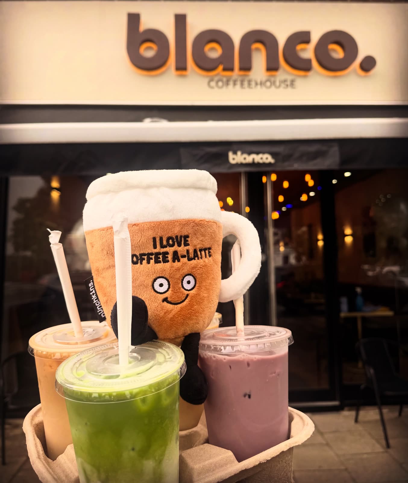 The Blanco Coffee House shopfront at 4 Fiveways Parade, with iced drinks on the pavement.